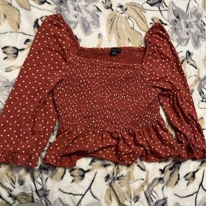 three pretty shirts. two smalls one medium